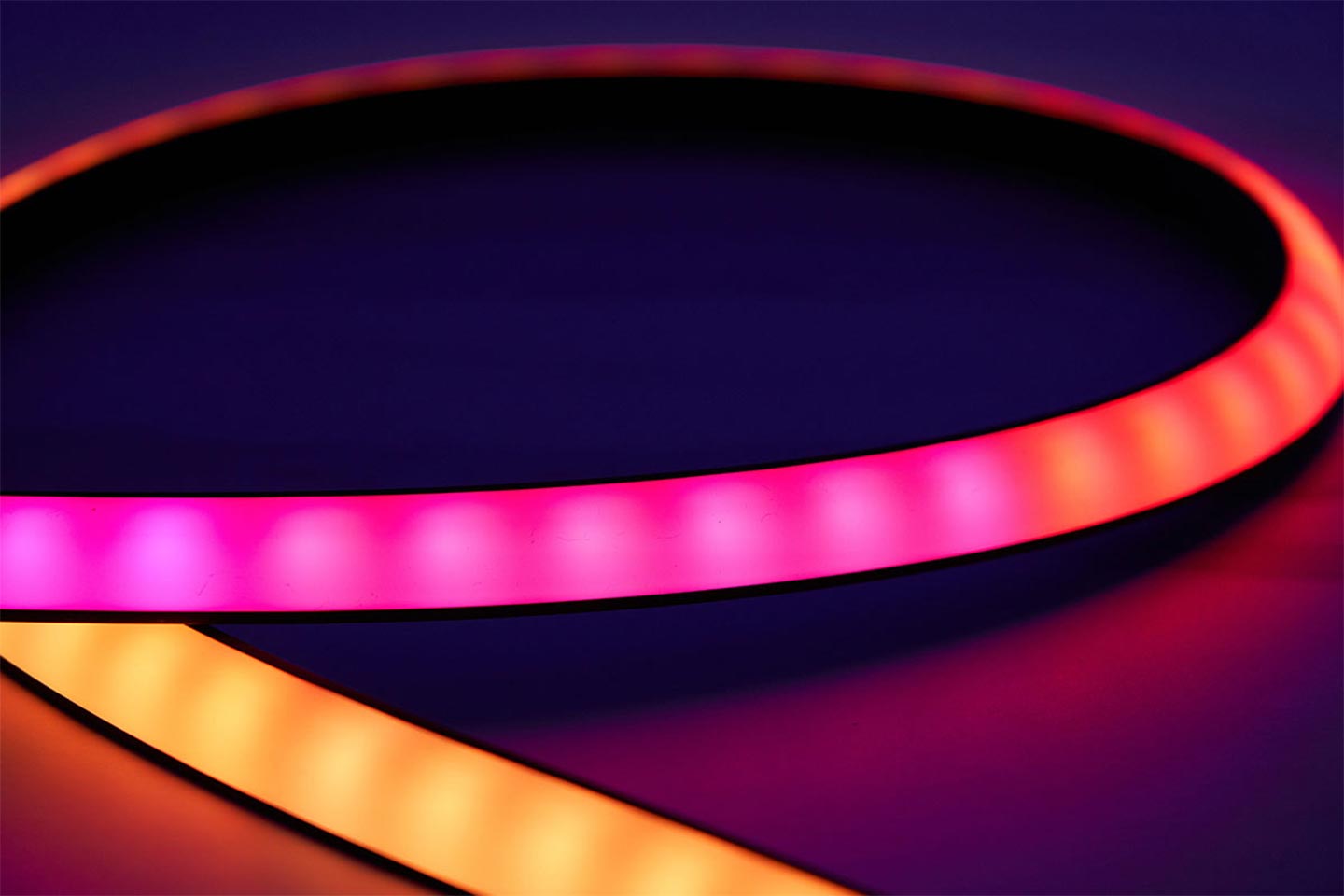 The matte oil coating on the outer layer of the light strip and the black silicone encapsulation method allow the internal LED lamp beads to have a better light projection effect, and the light strip body is also flexible.
